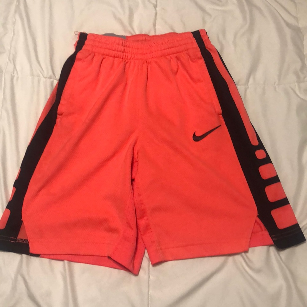 Pink colored Nike shorts